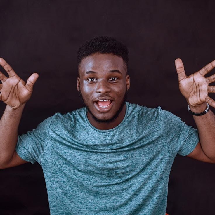 Alex Carter, Lead Design Curator at GardenOrbitalRiver, reviewing corporate floral arrangements